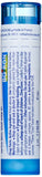 Close-up de pellets Boiron Histaminum mostrando textura y tamaño, Boiron y administración cómoda