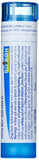 Close-up de pellets Boiron mostrando textura y rápida disolución para comodidad