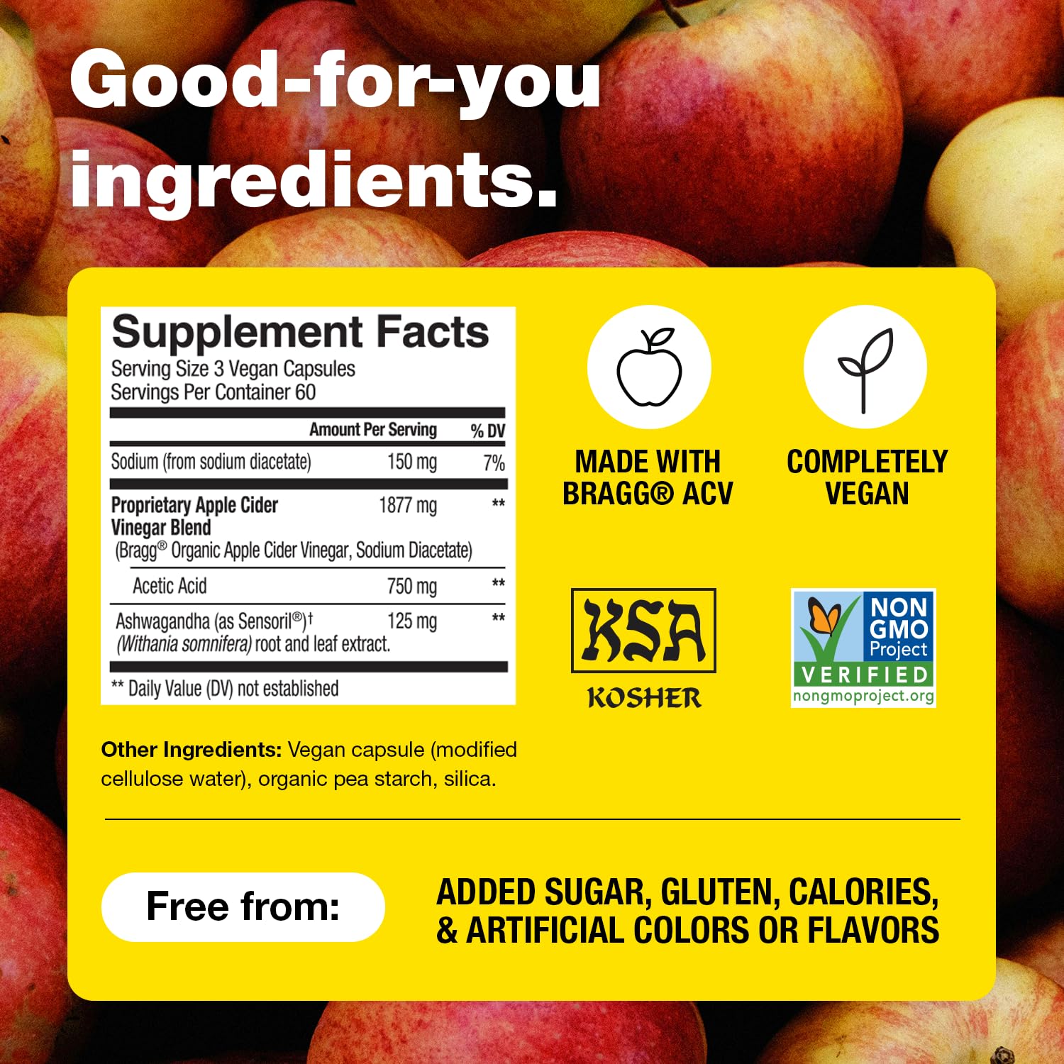 Bragg cápsulas junto a raíces de ashwagandha y manzanas representando ingredientes