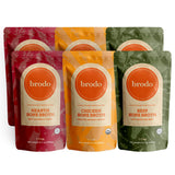 Brodo pack frontal mostrando las tres variedades y conveniencia para beber
