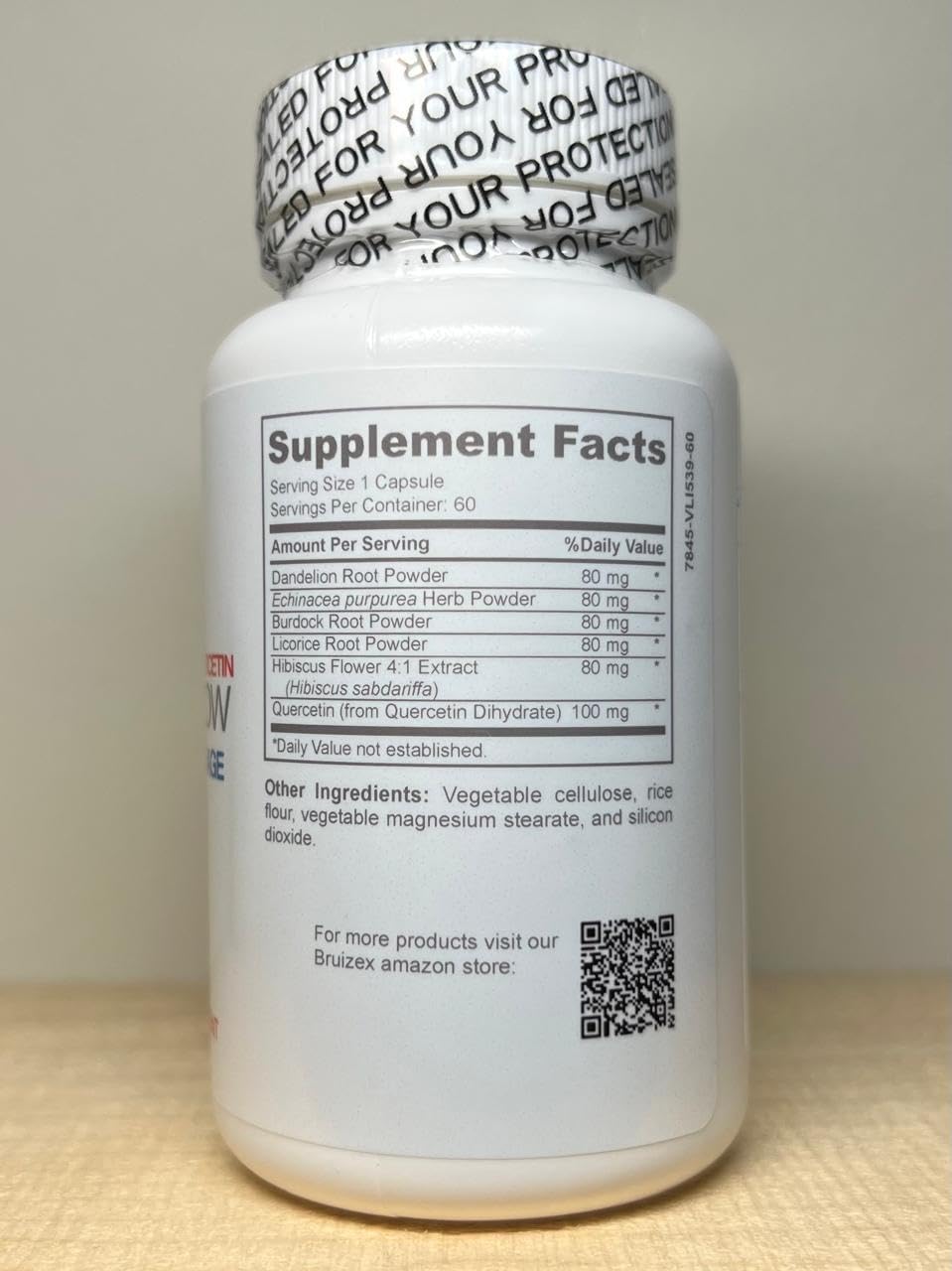 Bruizex frasco junto a vaso de agua listos para toma diaria y conveniencia