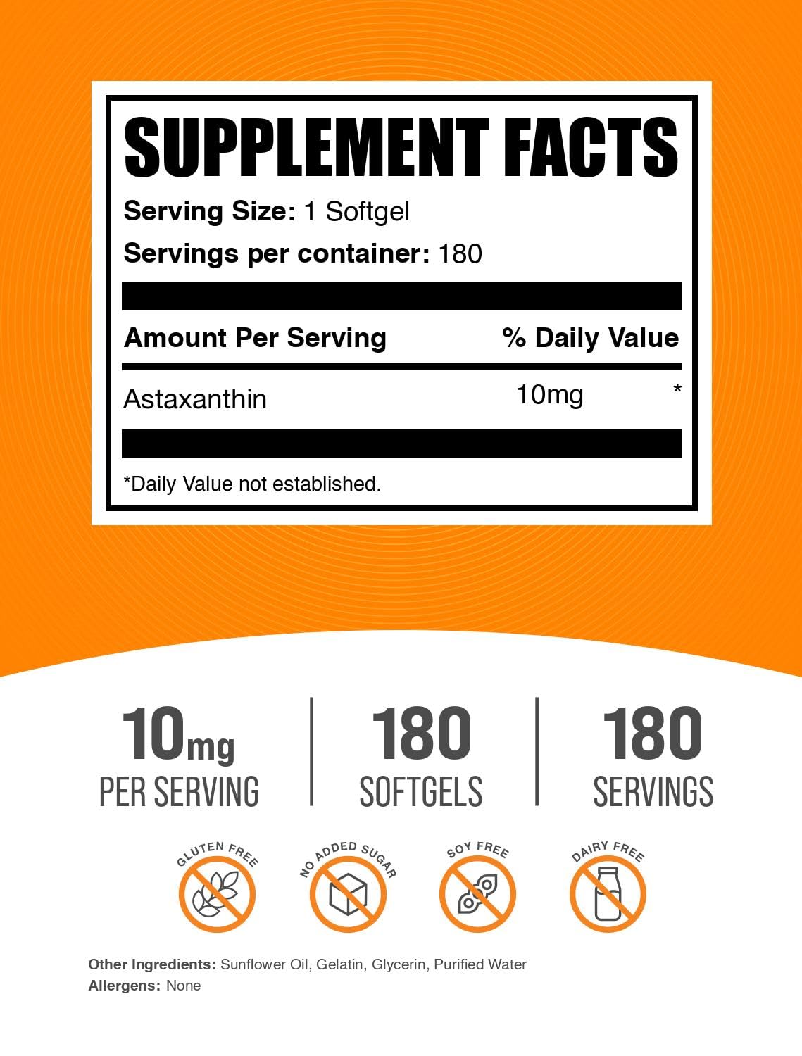 BulkSupplements primer plano de un softgel de astaxantina mostrando textura y calidad