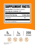 BulkSupplements detalle del polvo de L‑Leucina, textura fina que facilita mezcla rápida