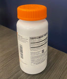 BulkSupplements cápsula junto a vaso y libreta de rutina diaria
