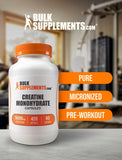 BulkSupplements cápsulas junto a botella de agua durante entrenamiento
