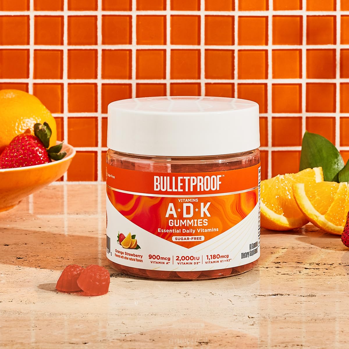 Bulletproof gominolas en mano para comparar tamaño y facilitar dosis