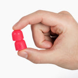 Comparación de tamaño Burst Creatine junto a una moneda para escala visual