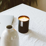 Calyan Wax Co. envase y tapadera destacando presentación premium y conservación