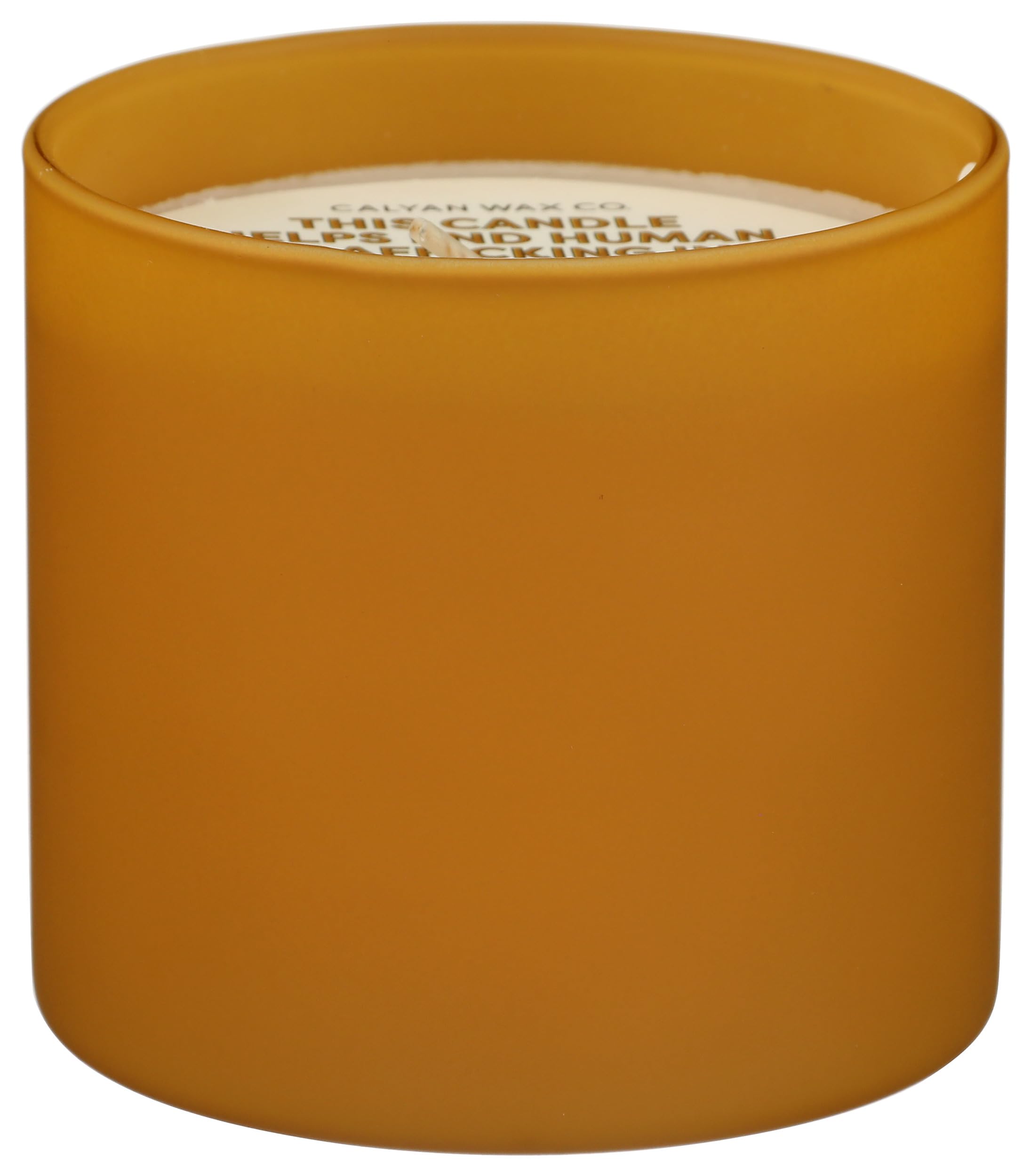 Calyan Wax Co. vela encendida creando ambiente cálido y acogedor