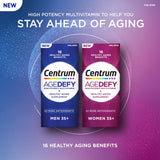 Centrum Age Defy frasco en una encimera de cocina junto a frutas para usar diario