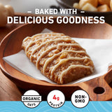 Barra CLIF Bar Mini en mano para comparar porción y portabilidad