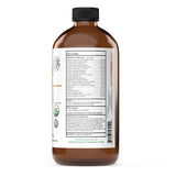 Complete Natural Products junto a una regla para comparar tamaño de la botella 16oz