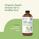 Complete Natural Products botella de 8oz apoyada en superficie para escala visual
