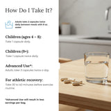 Colostrum-LD cápsulas junto a un vaso de agua indicando modo de uso recomendado