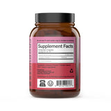 Complete Natural Products cápsulas en mano para comparar tamaño y dosificación