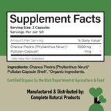 Complete Natural Products mano sosteniendo cápsula para demostrar uso fácil