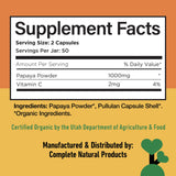 Complete Natural Products frasco en cocina junto a alimentos para uso cotidiano