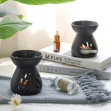 ComSaf cuchara tealight en uso para manipular cera sin quemaduras