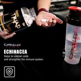 CONTROLLED LABS frasco junto a pesas en gimnasio mostrando uso deportivo