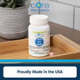 Core Med Science producto en mesa junto a vaso y libreta, uso cotidiano sencillo