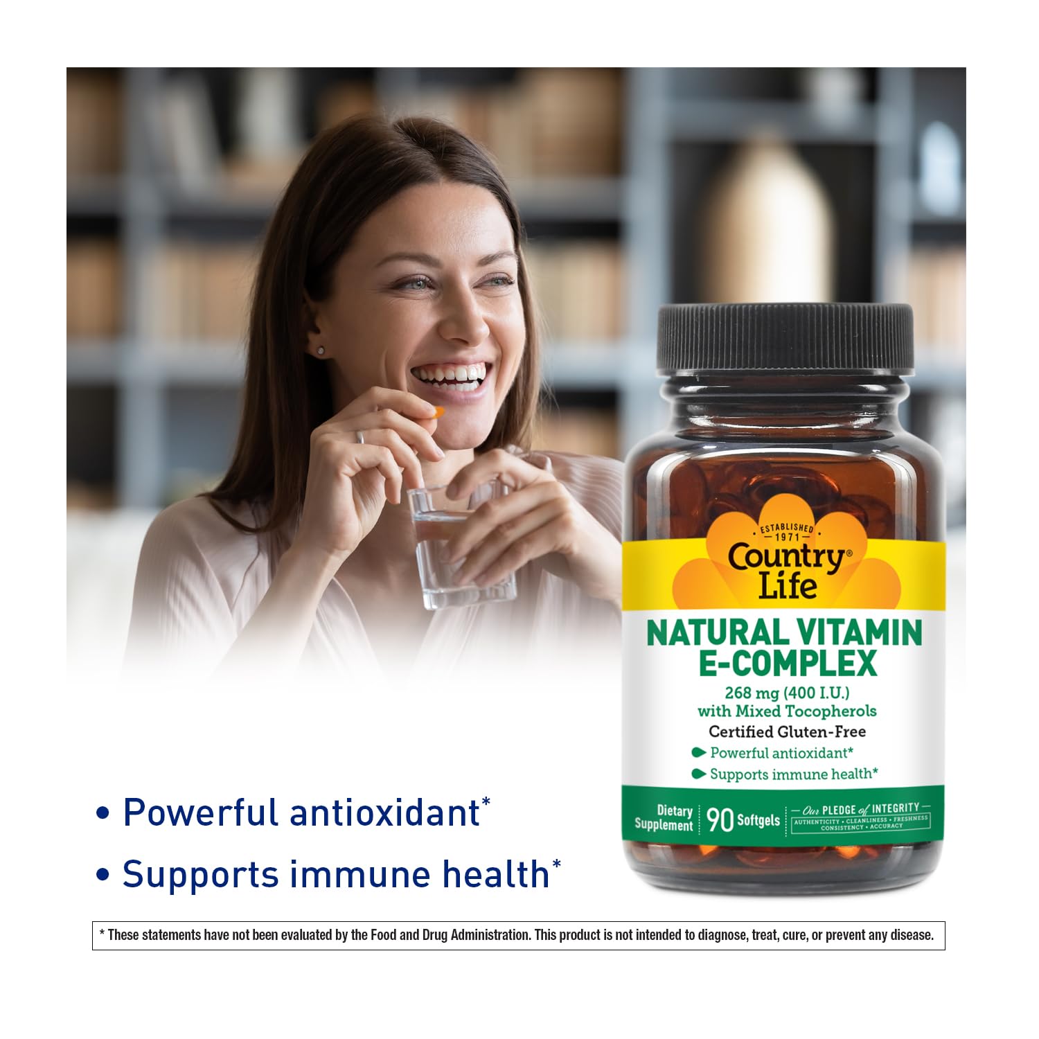 Country Life primer plano de softgel Vitamin E-Complex que ilustra textura lisa y fácil ingesta