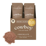Cowboy Colostrum empaque frontal mostrando sobres y beneficio de conveniencia