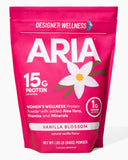 Designer Wellness Aria frente del envase mostrando sabor y peso 1.85 lb, ideal para control calórico