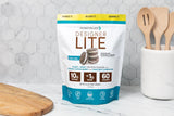Designer Wellness etiqueta de ingredientes que destaca proteínas, prebióticos y vitaminas
