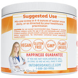 Doctor Danielle polvo Gut Assist servido junto a naranja para sugerir sabor