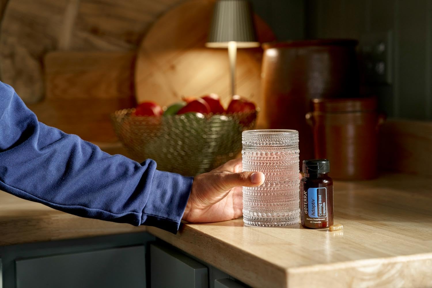 doTERRA frasco en ambiente relajado sugiere integración en rutina
