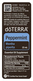 doTERRA hojas de menta junto a botella para destacar origen natural