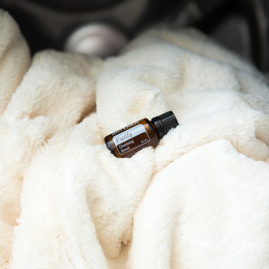doTERRA Purify aplicado en ropa para eliminar olores en el lavado