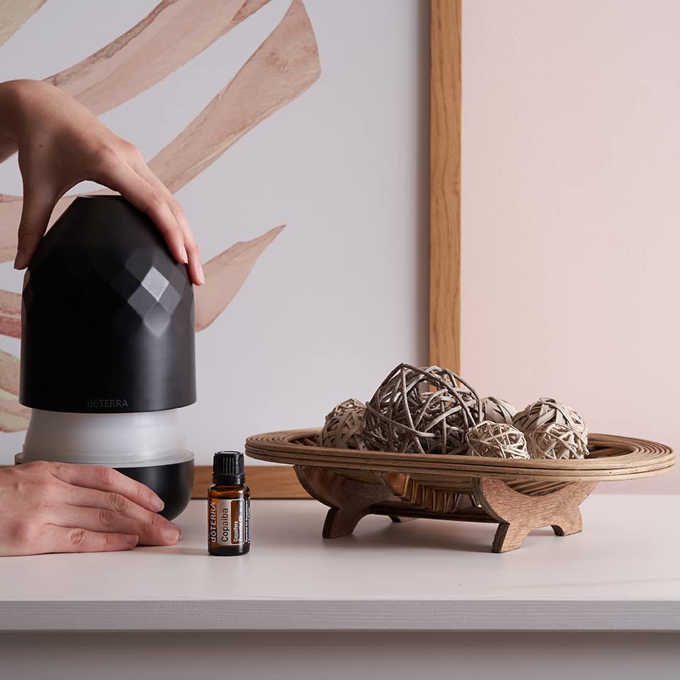doTERRA Copaiba gota sobre aceite portador, facilita aplicación tópica segura