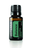 doTERRA imagen frontal del frasco mostrando etiqueta y beneficio de equilibrio