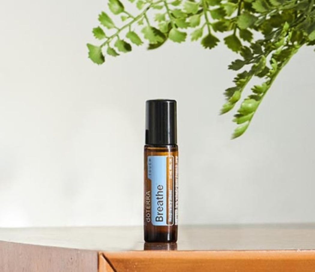 dōTERRA Breathe Touch aplicado en el pecho para crear ambiente reconfortante