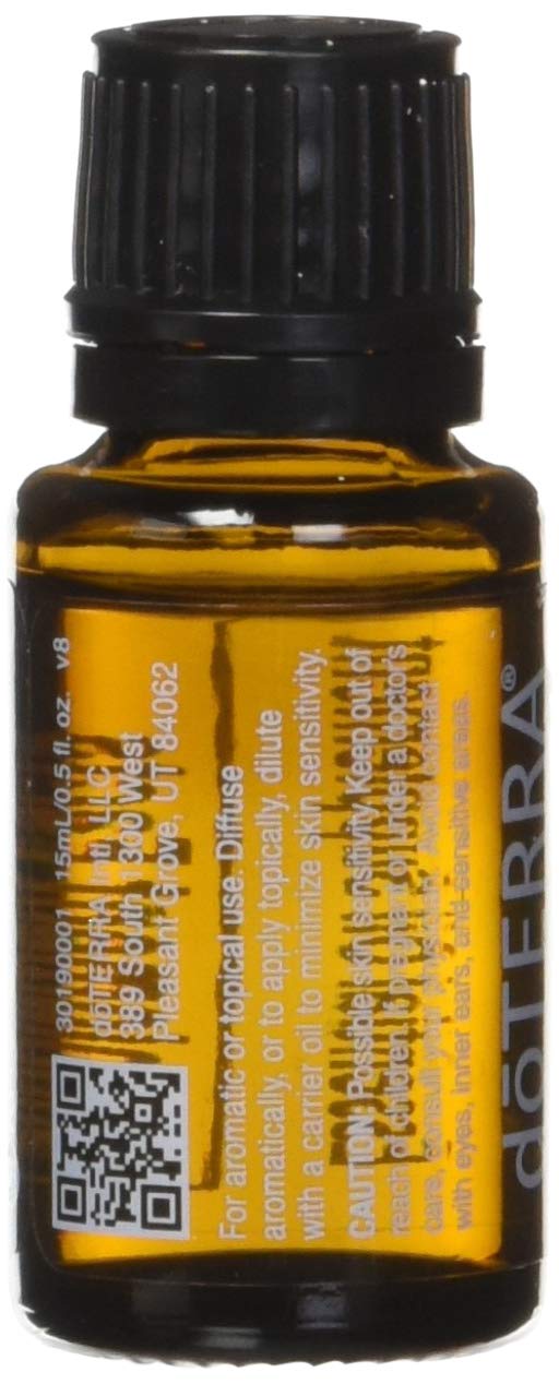 doTERRA botella junto a difusor encendido, aroma inmediato