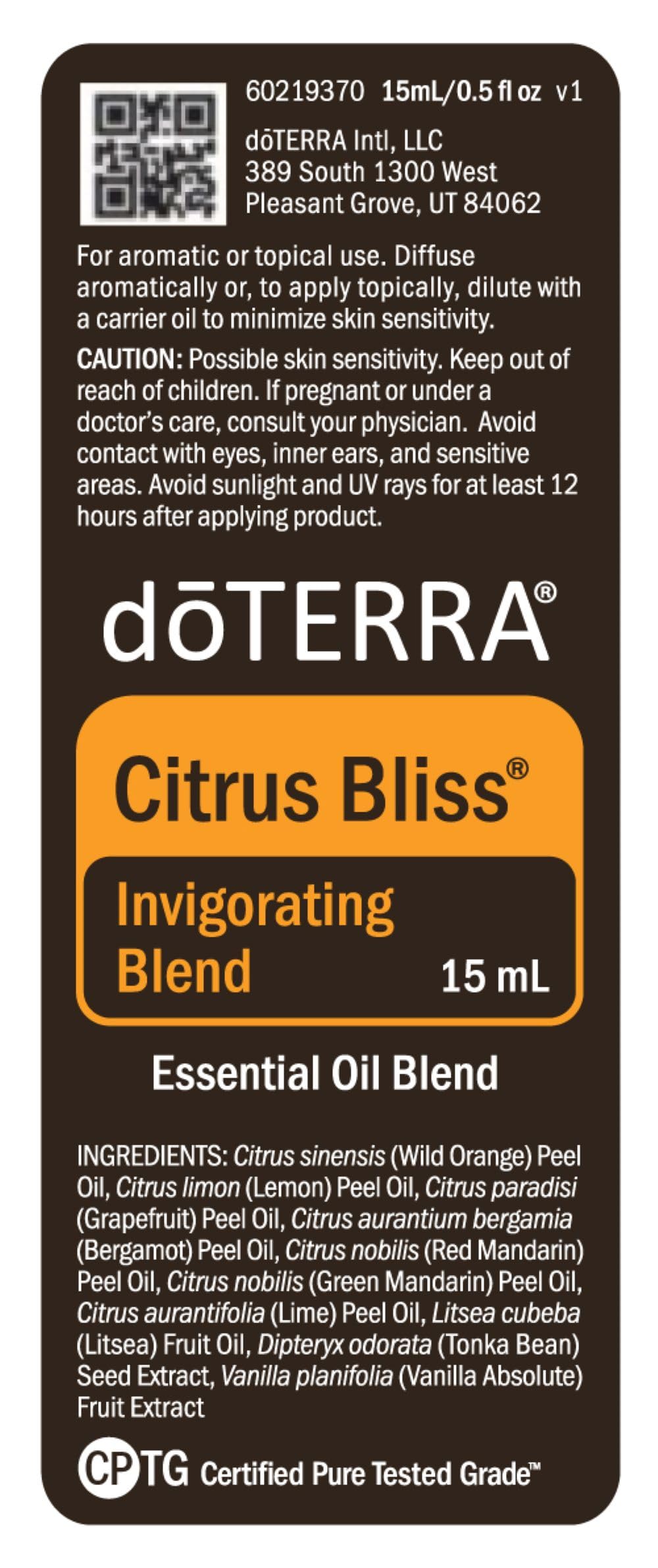 doTERRA Citrus Bliss comparado con una moneda para apreciar tamaño práctico