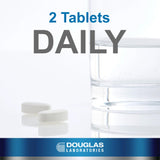 Douglas Laboratories cápsulas en mano para comparar tamaño práctico
