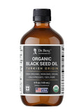 Dr. Berg botella frontal mostrando aceite de semilla negra para cuidado diario