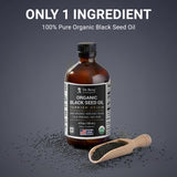 Gota del aceite Dr. Berg Nigella sativa que muestra su textura ligera