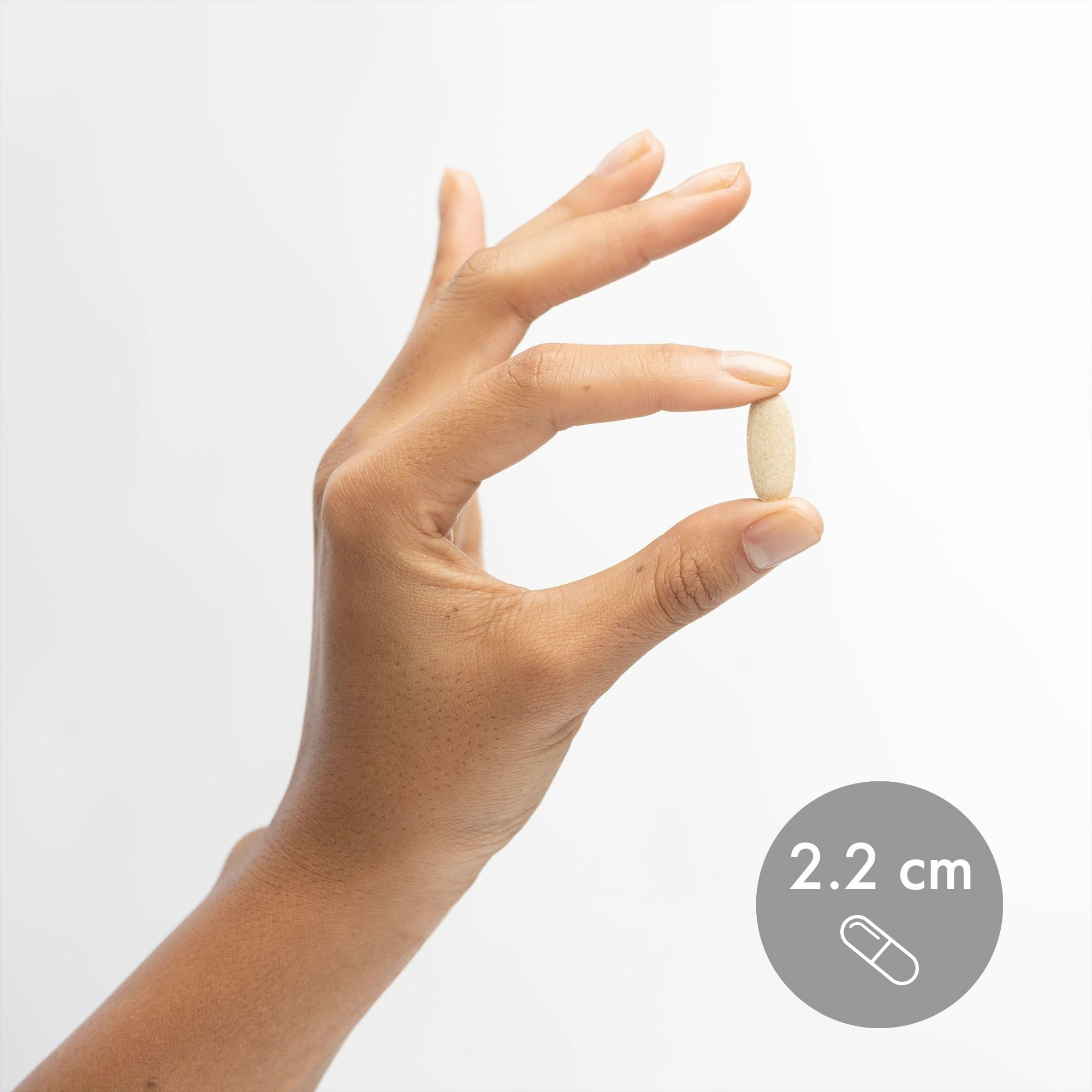 Dr. Mercola caja abierta con tabletas apiladas para visual del contenido