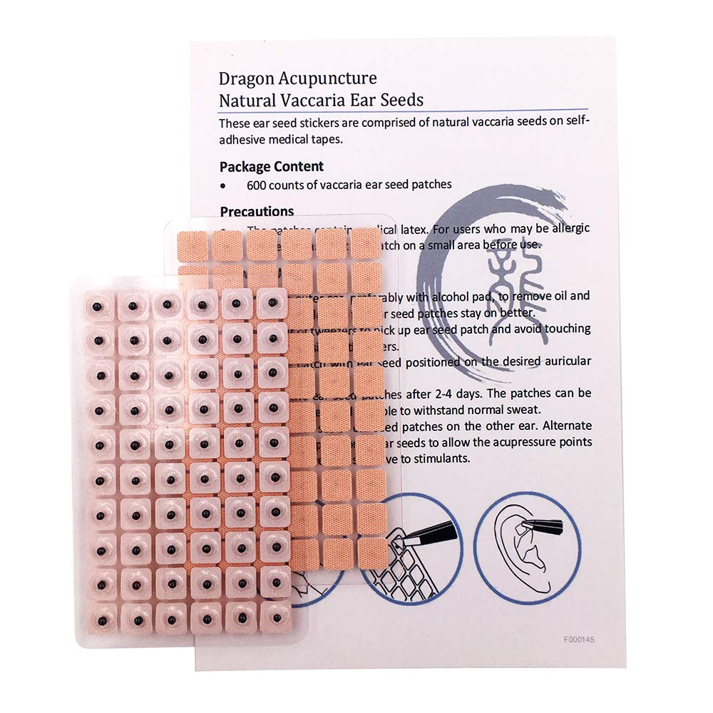 Dragon Acupuncture - primer plano de una semilla auricular mostrando detalle y precisión