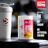 Dymatize cuchara con polvo detalle de textura y facilidad de mezcla