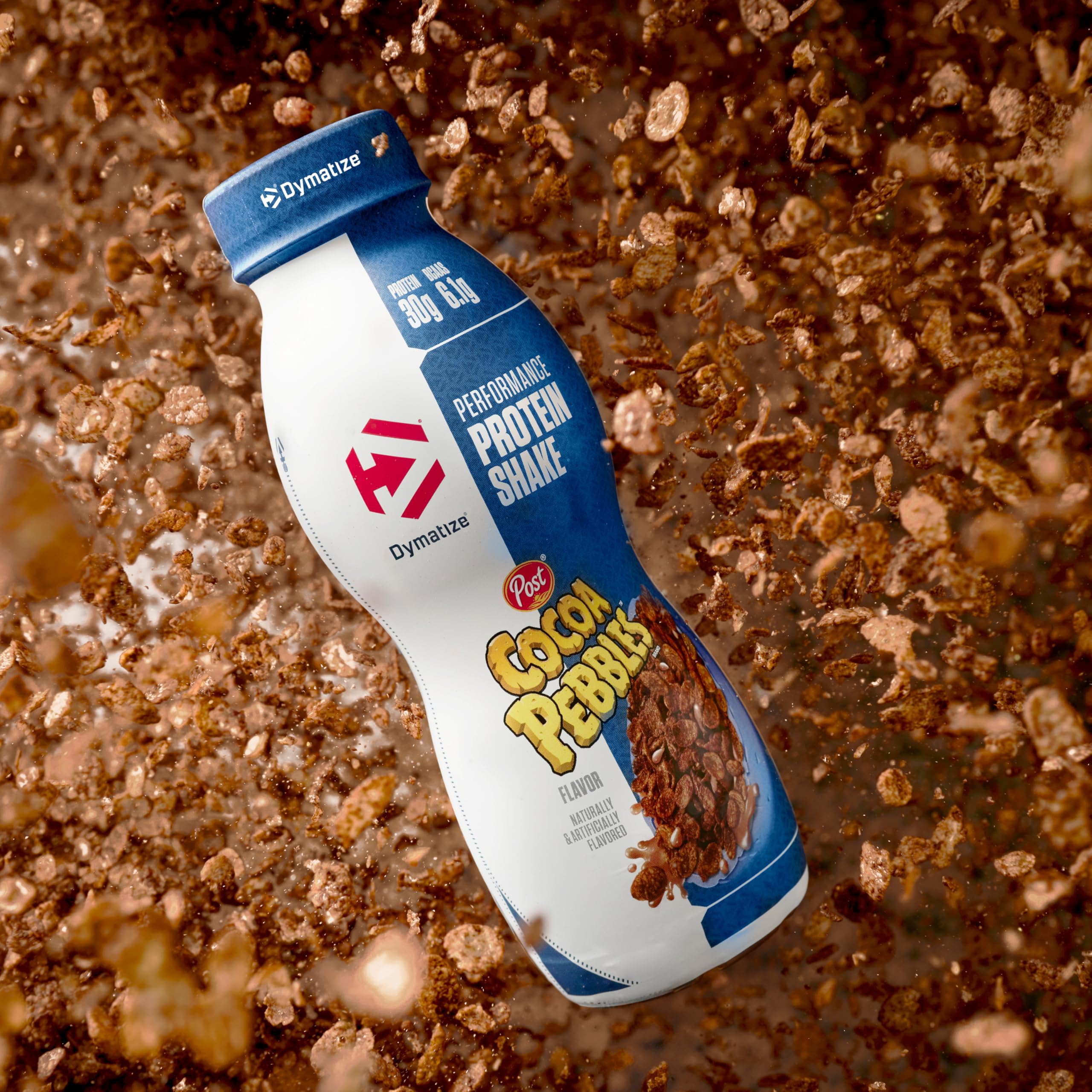 Dymatize vertido cremoso en vaso mostrando textura y apetito