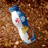 Dymatize vertido cremoso en vaso mostrando textura y apetito