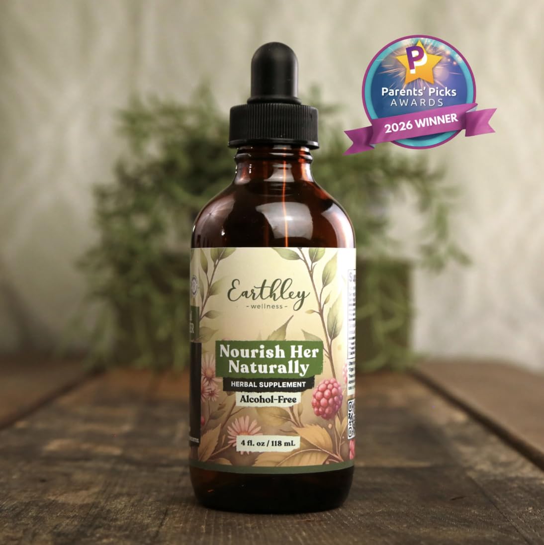 Earthley Wellness frasco junto a una regla para demostrar tamaño 4oz
