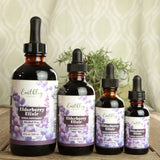 Earthley Wellness frasco en mano mostrando tamaño real 2 oz
