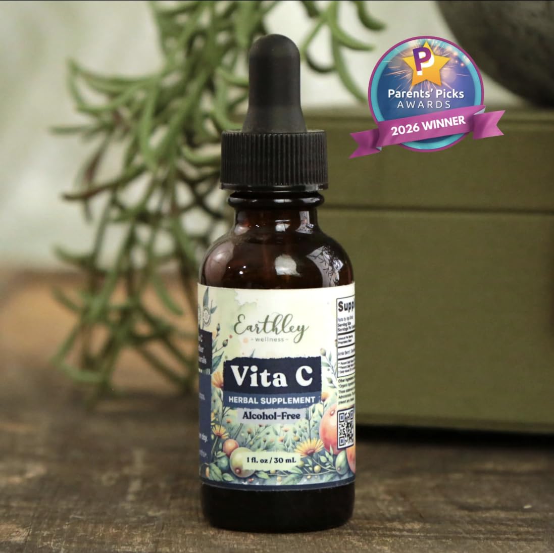 Botella de 2 oz junto a una regla para comparar tamaño, Earthley Wellness práctico y portátil