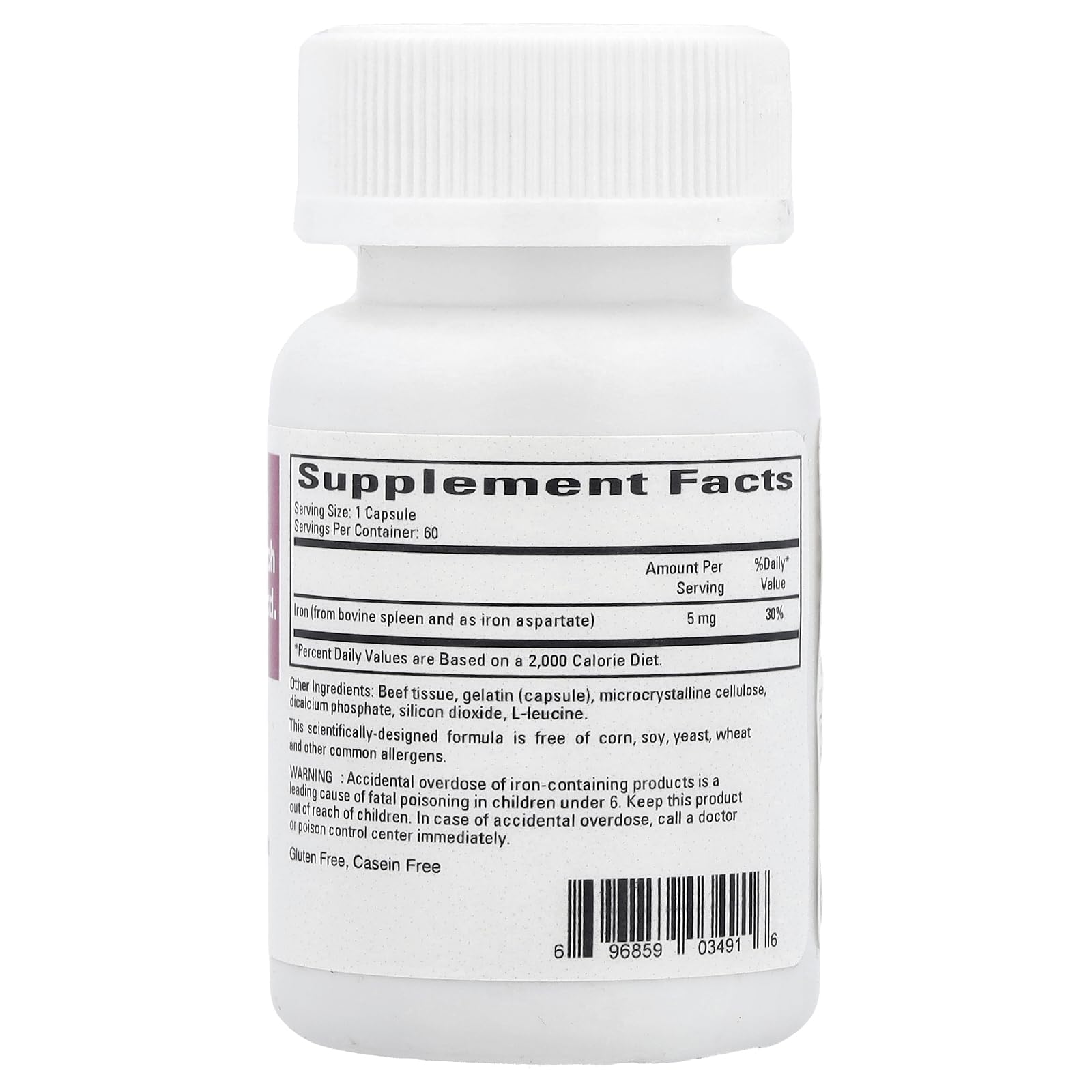 Detalle de una cápsula Ferritin Ecological Formulas mostrando textura y tamaño portátil