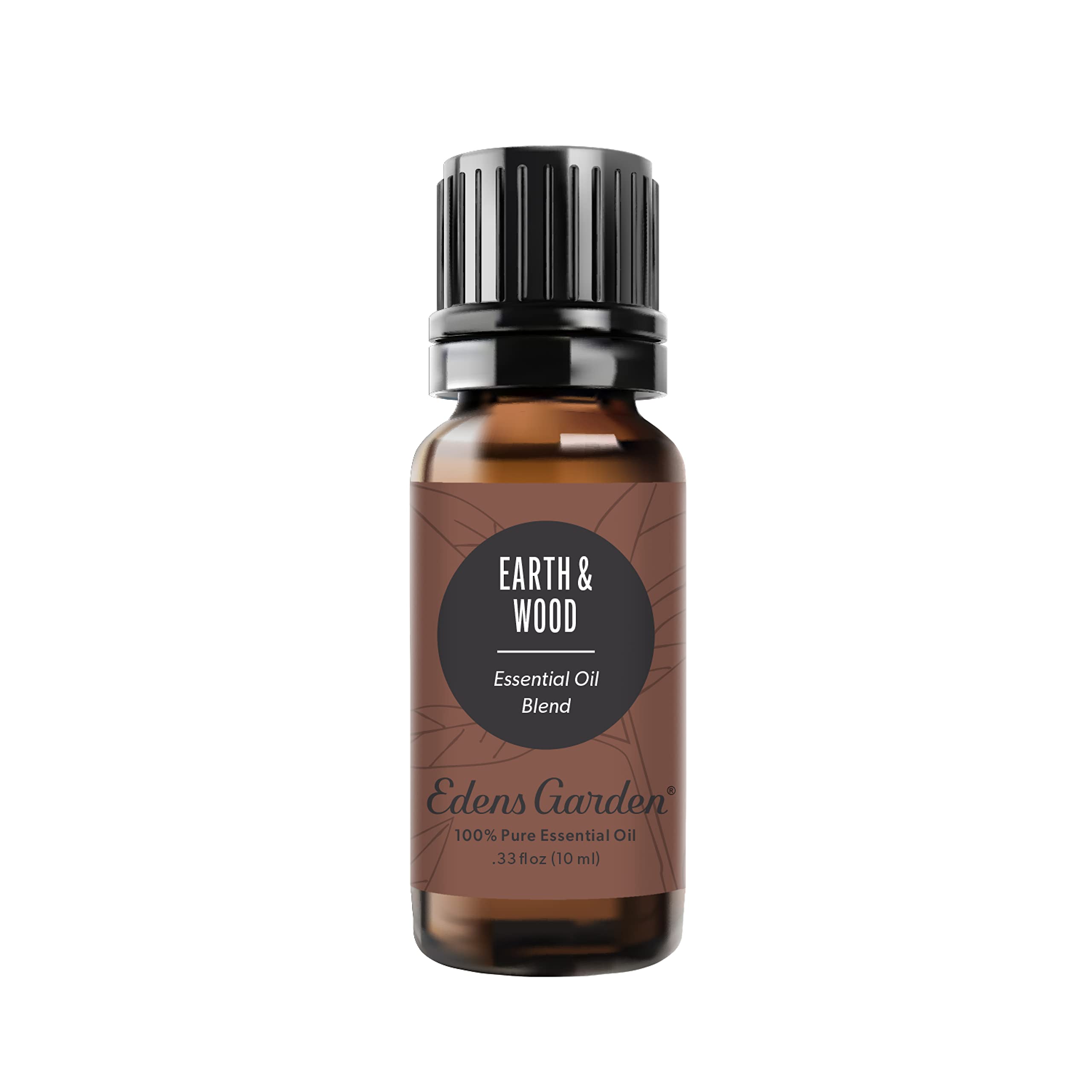 Edens Garden frasco frontal mostrando la mezcla Earth & Wood, ambiente natural